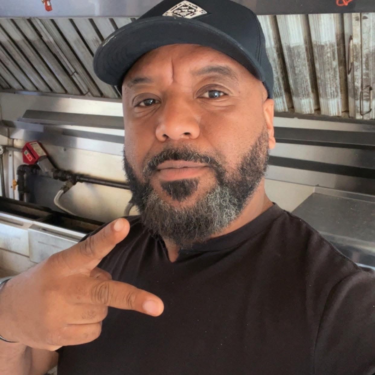 Earnie’s Food Truck team member inside the trailer