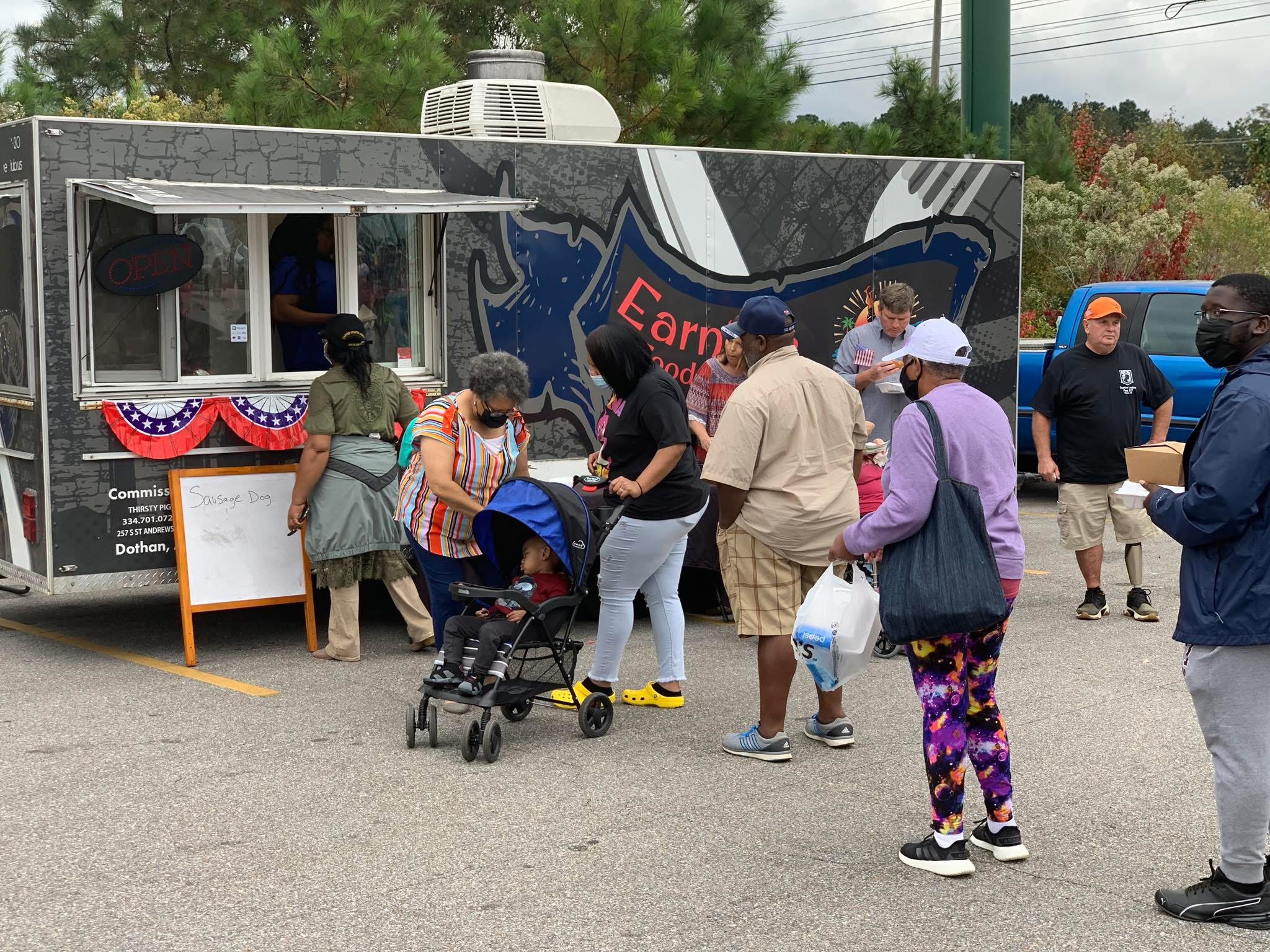 Customers ordering from Earnie’s Food Truck